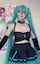 miku hatsune, green hair, corset, pale skin, cosplay