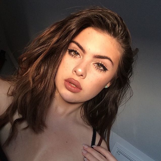 Who is she?