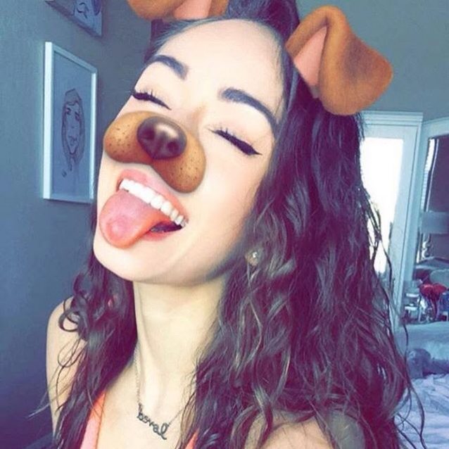 Who is she?
