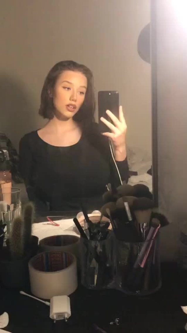 short hair busty brunette