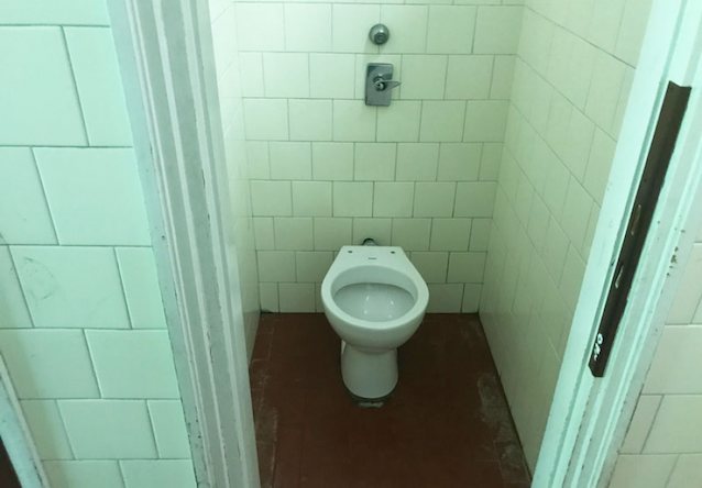 school school toilet cum on the door