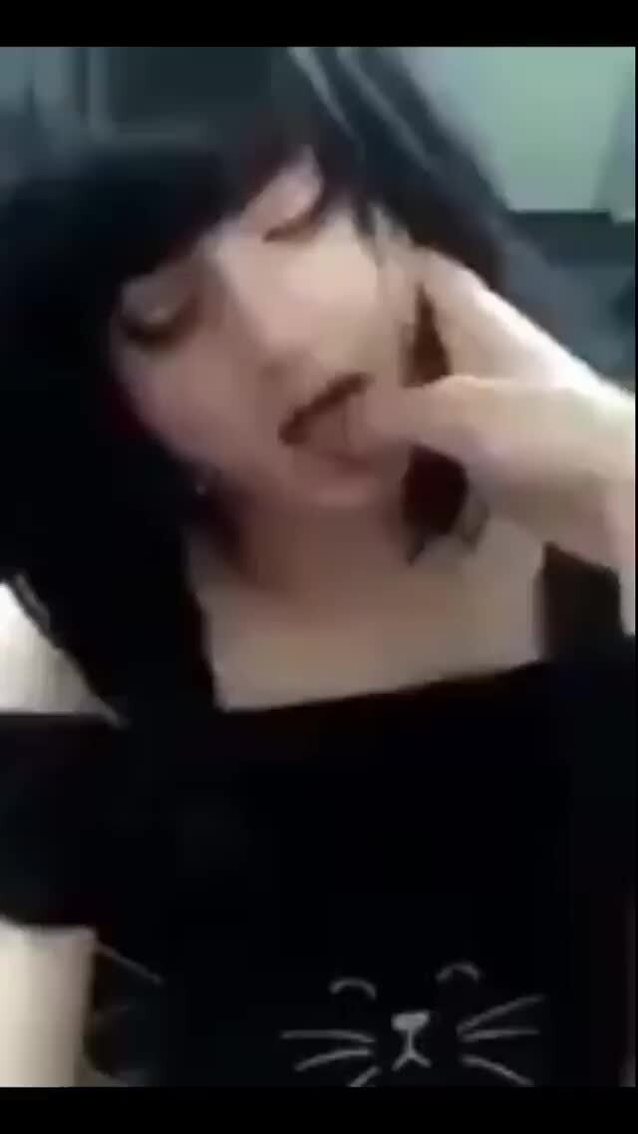 dark hair licking finger licking