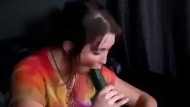 blowjob, brunette, cucumber, tie dye shirt, necklace