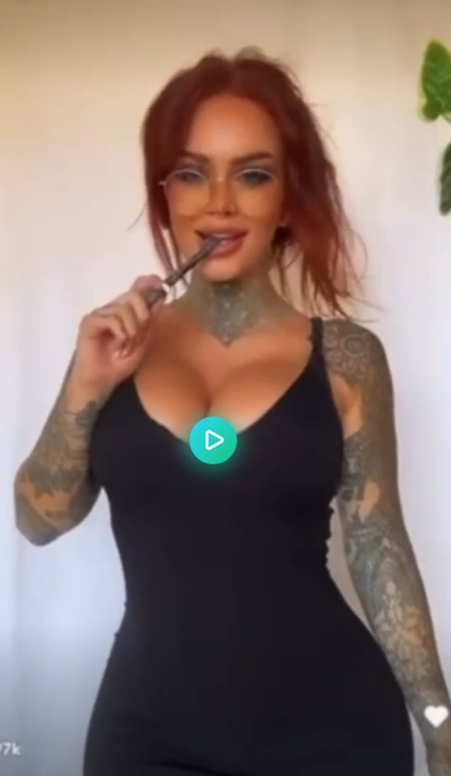 red hair, big tits, tattoos, glasses, piercing