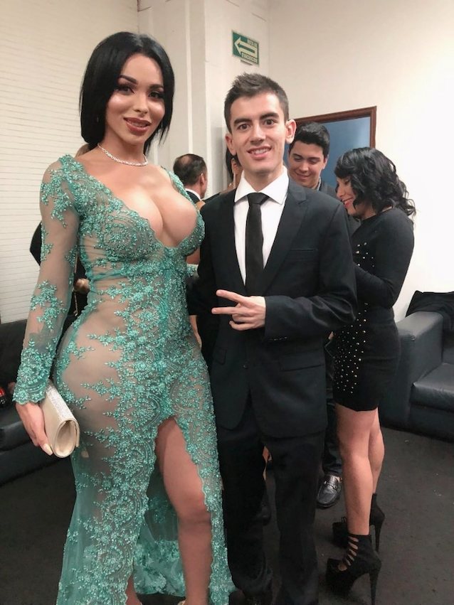 big tits black hair green dress