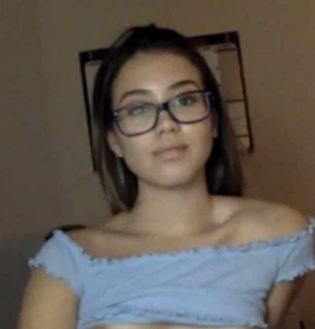 latina brunette glasses