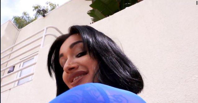 black hair, blue shirt, lips