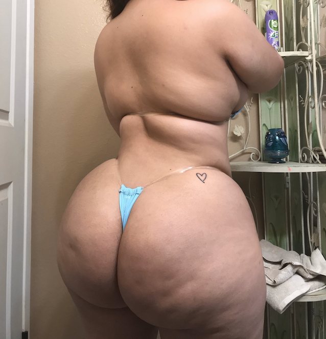 blue thong, cellulite, heart tatto