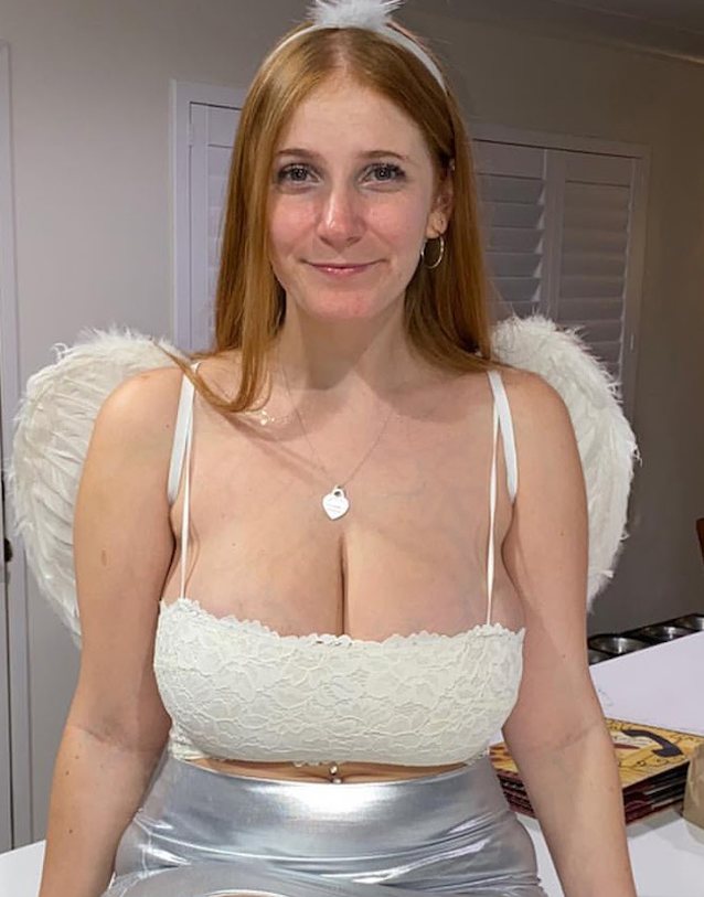 redhead clothed busty