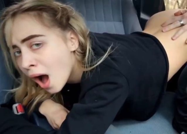 amateur blonde in a car