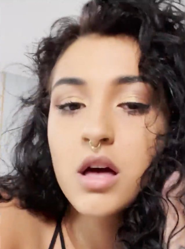 piercing curly hair tattoo