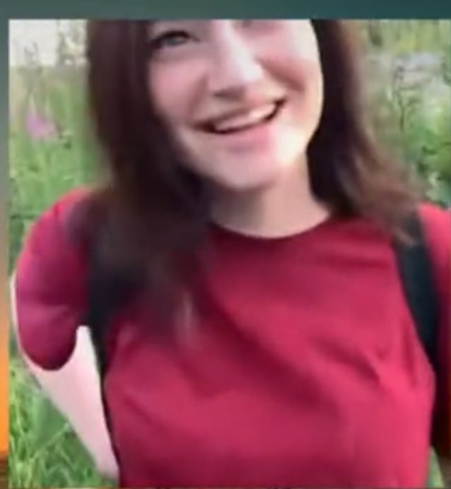 brunette smile red shirt