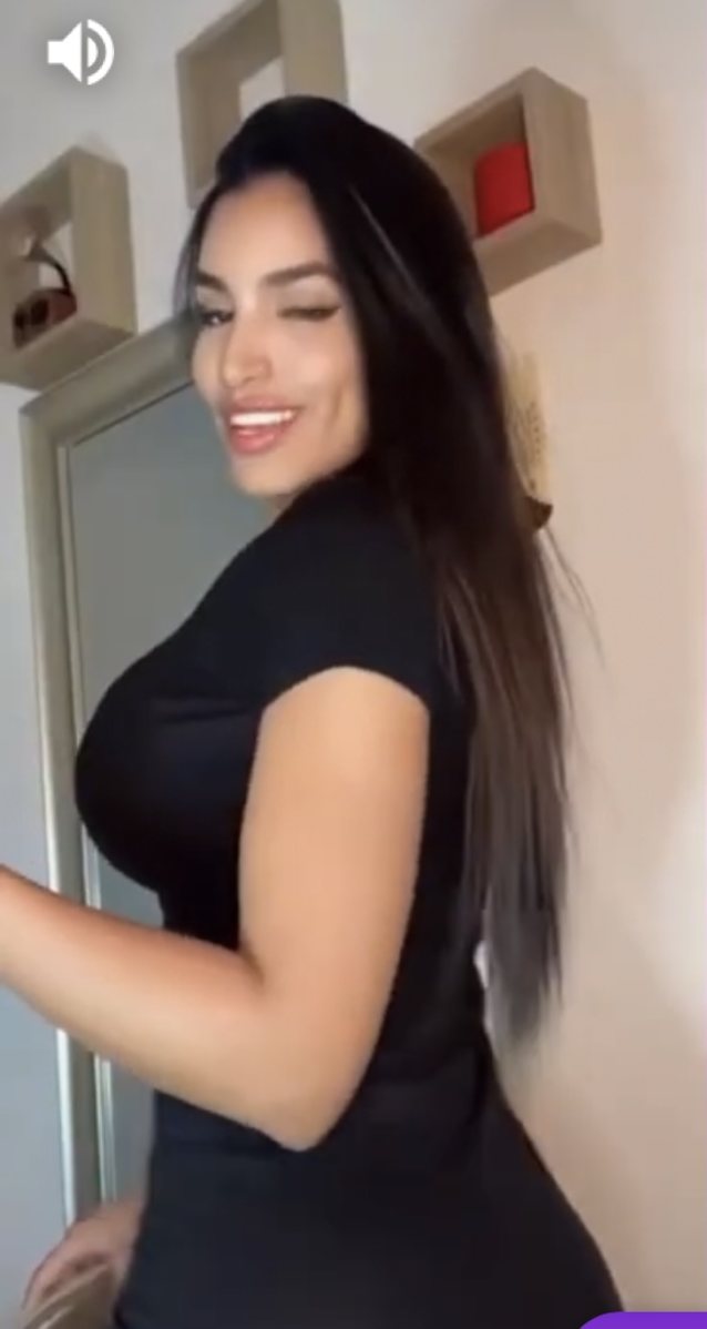 latina black dress busty