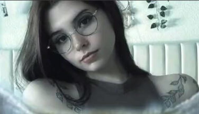 glasses, tatoo, black hair