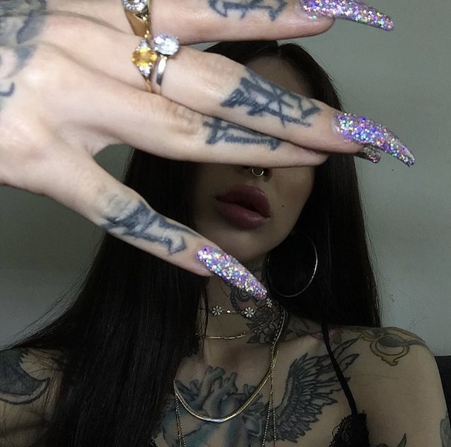 tatto, hoops, nails, jewelry, brunette