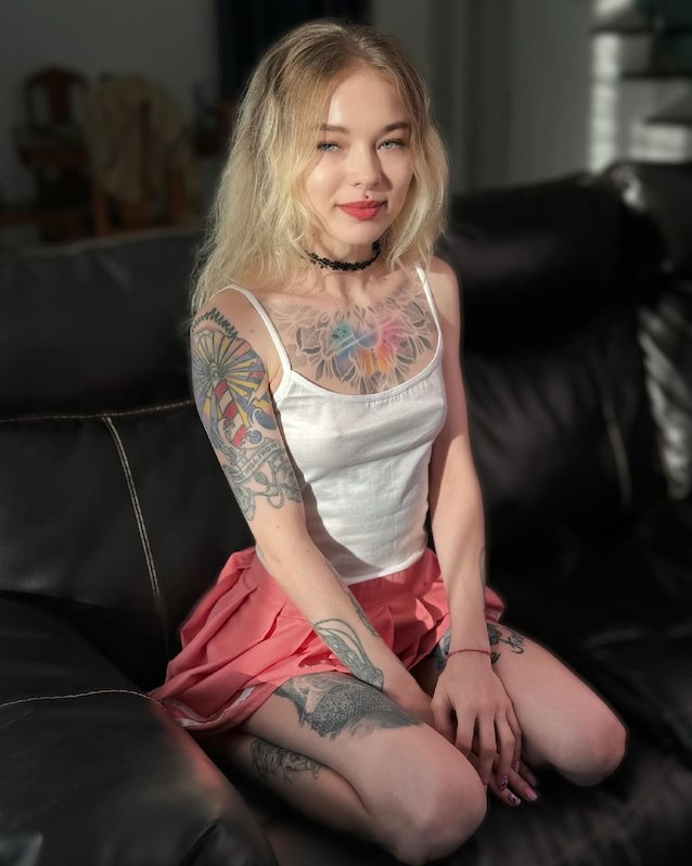 blonde, tattooed, skirt