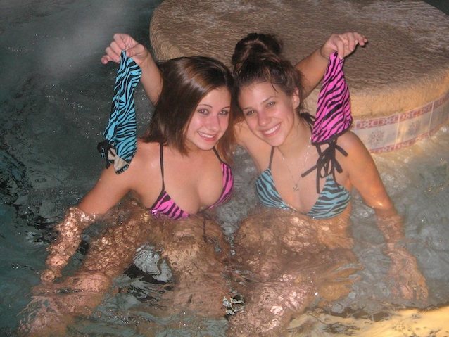 two girls swimming pool bikini