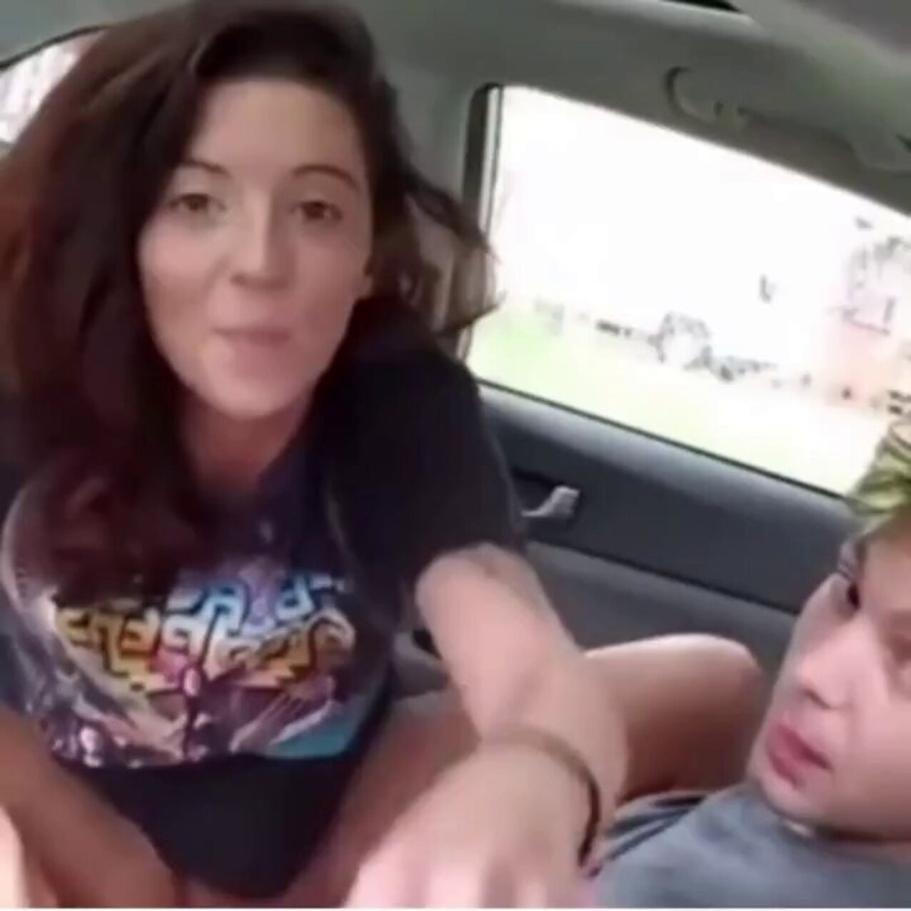 car brunette riding