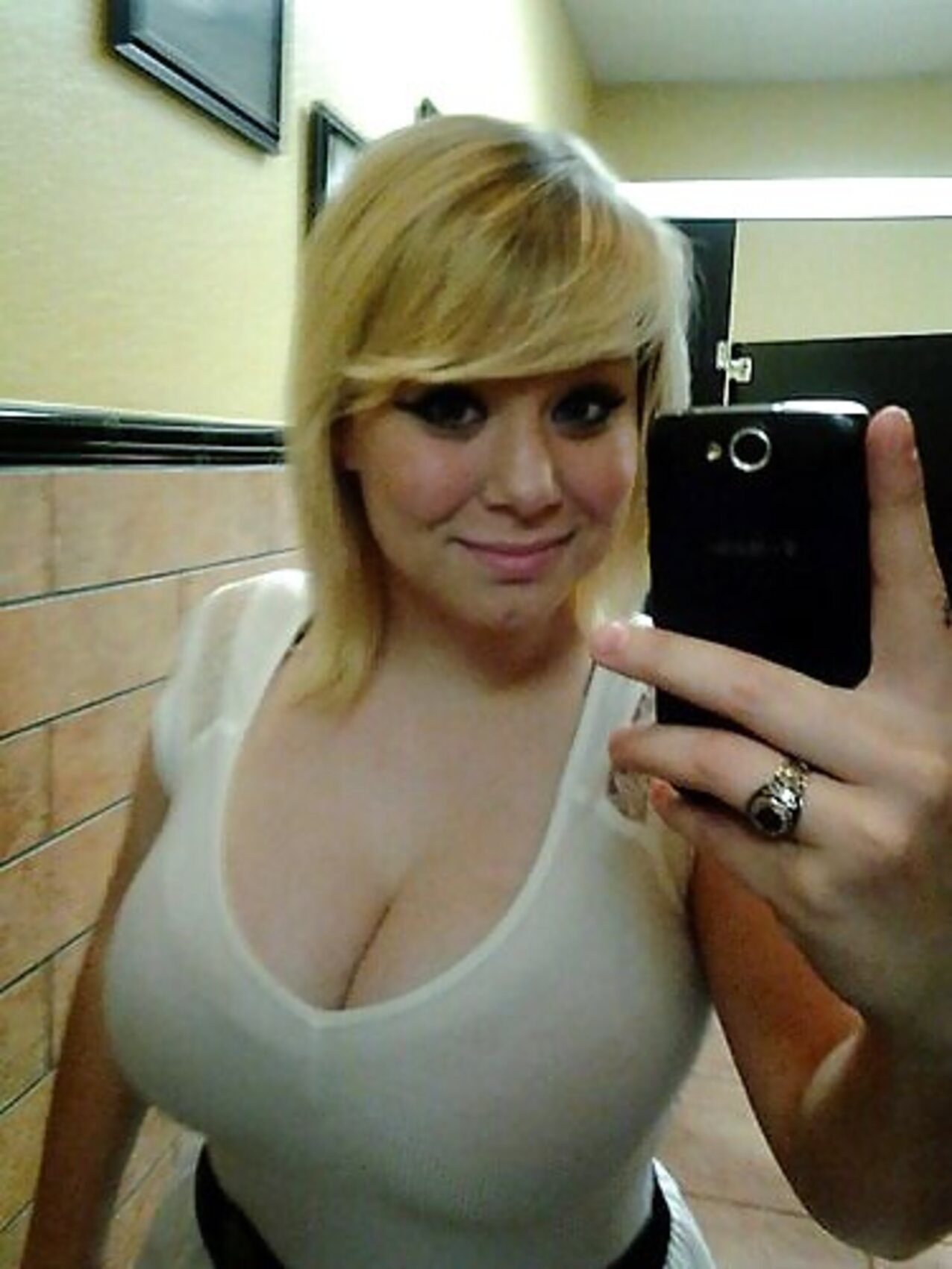 busty blonde selfie