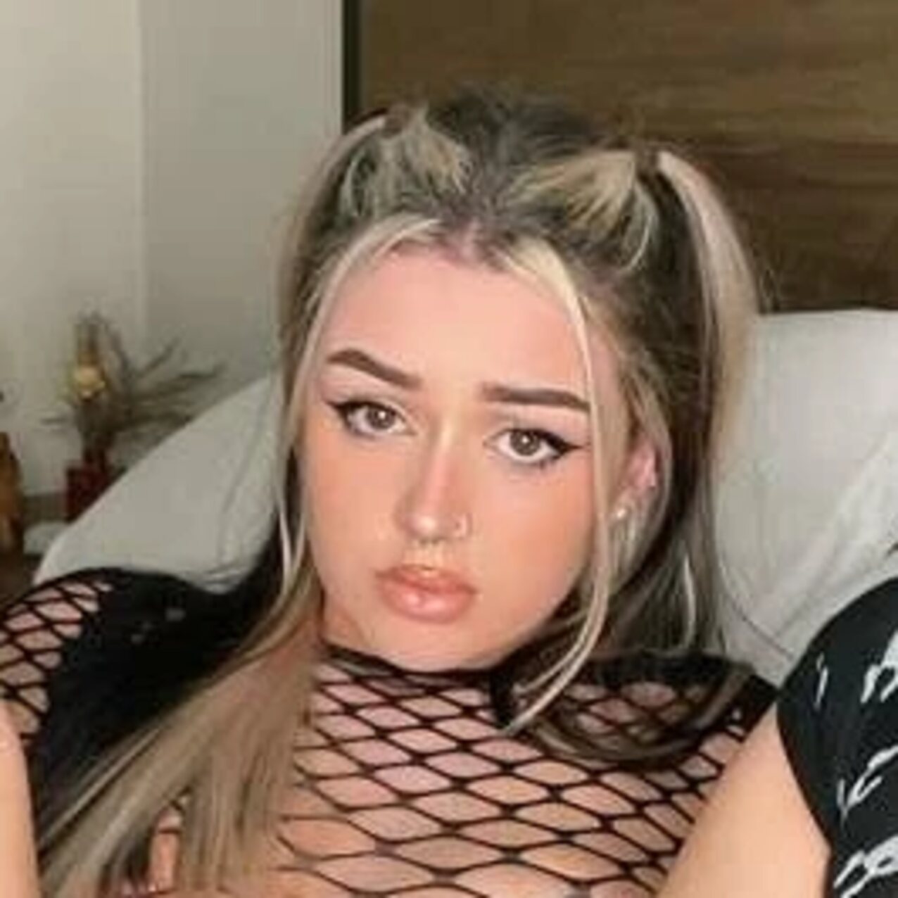 blonde nose ring pigtails