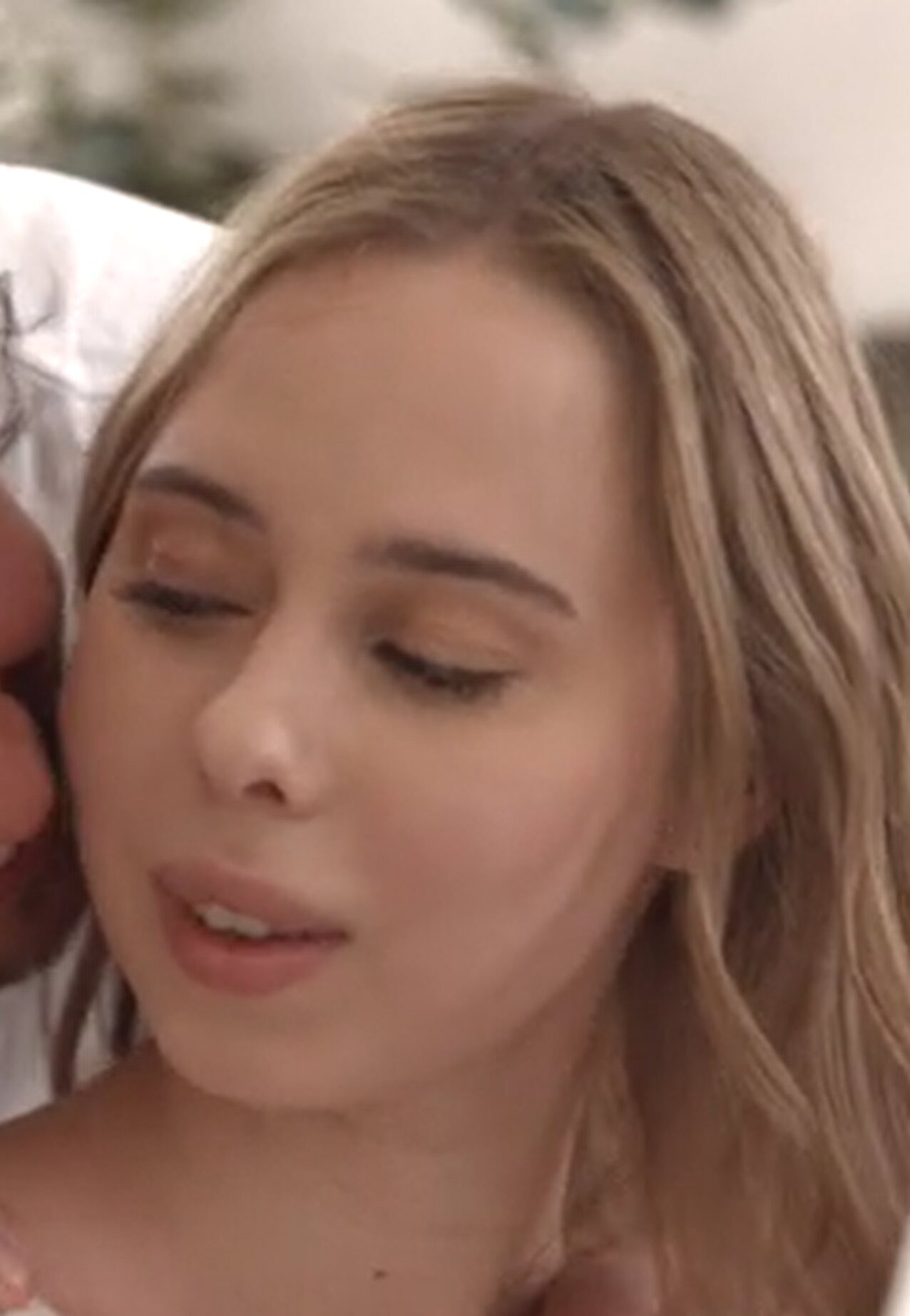 blonde button nose weak chin