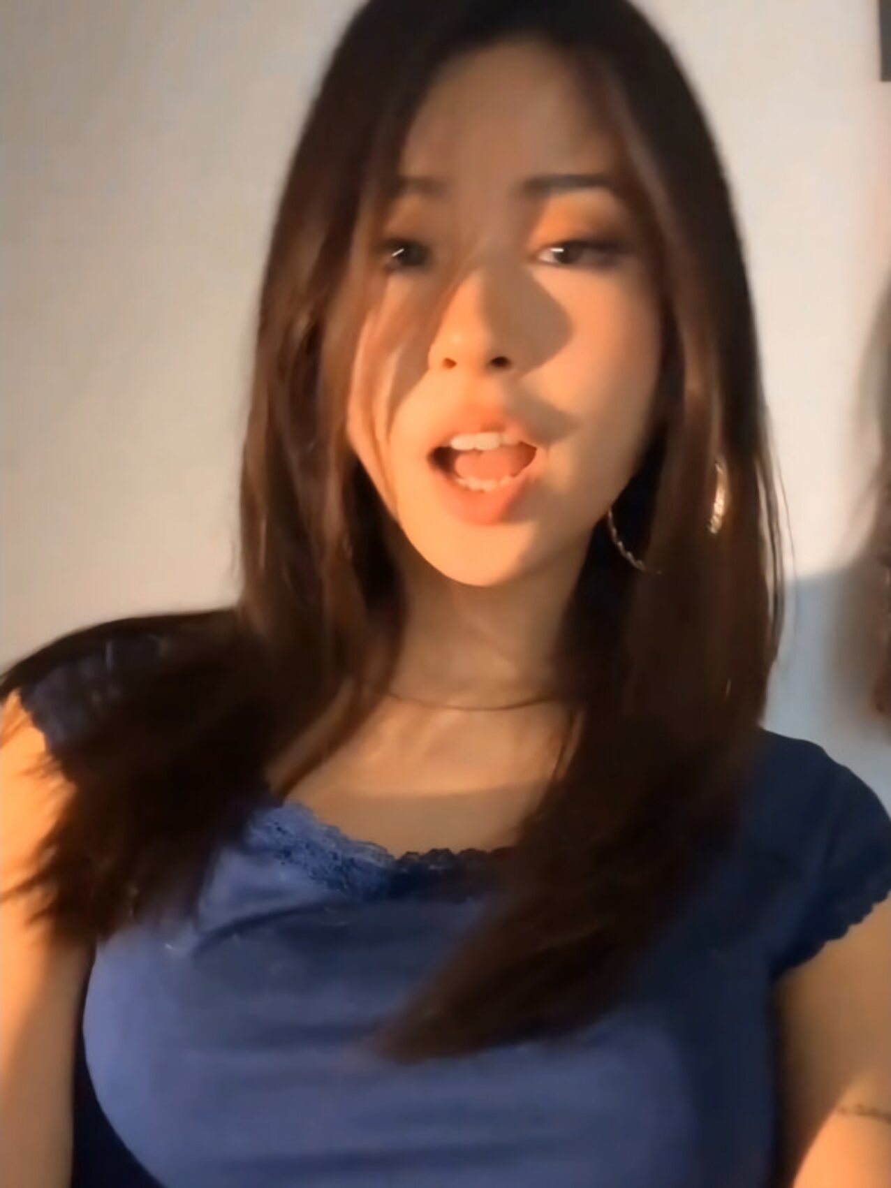 asian blue shirt busty