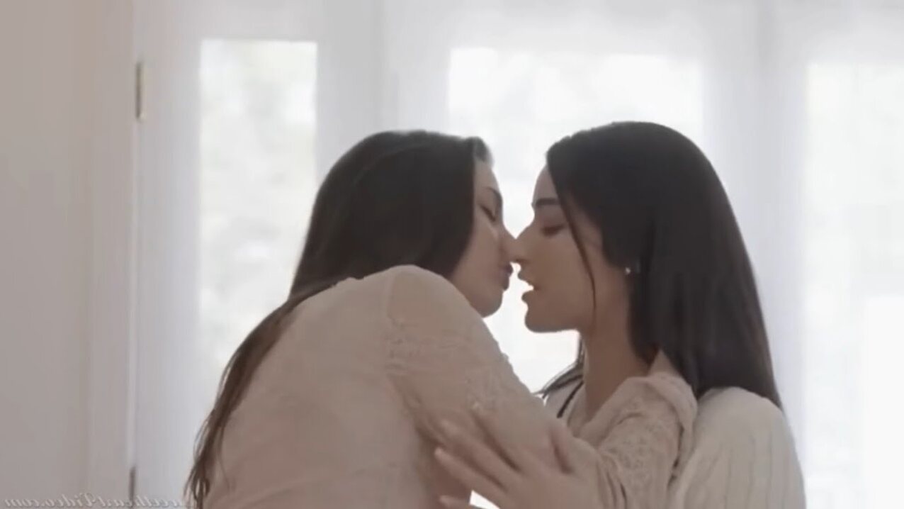 lesbian kissing bedroom