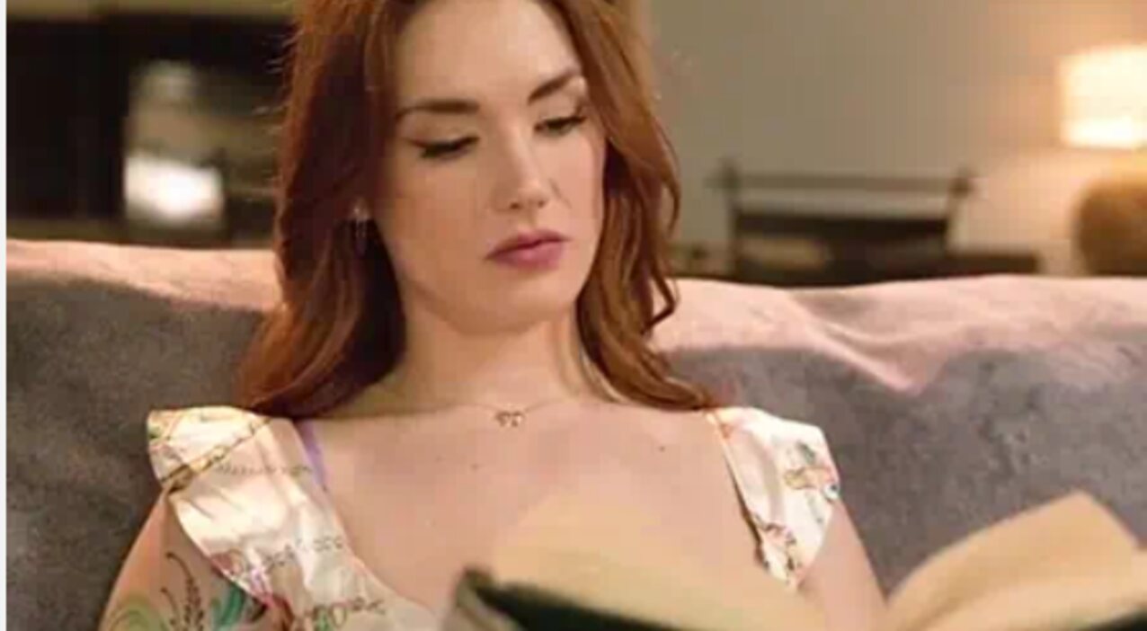 white tattoo redhead
