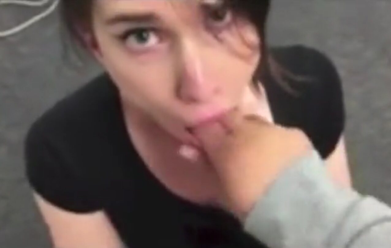 brunette on her knees fingers in mouth