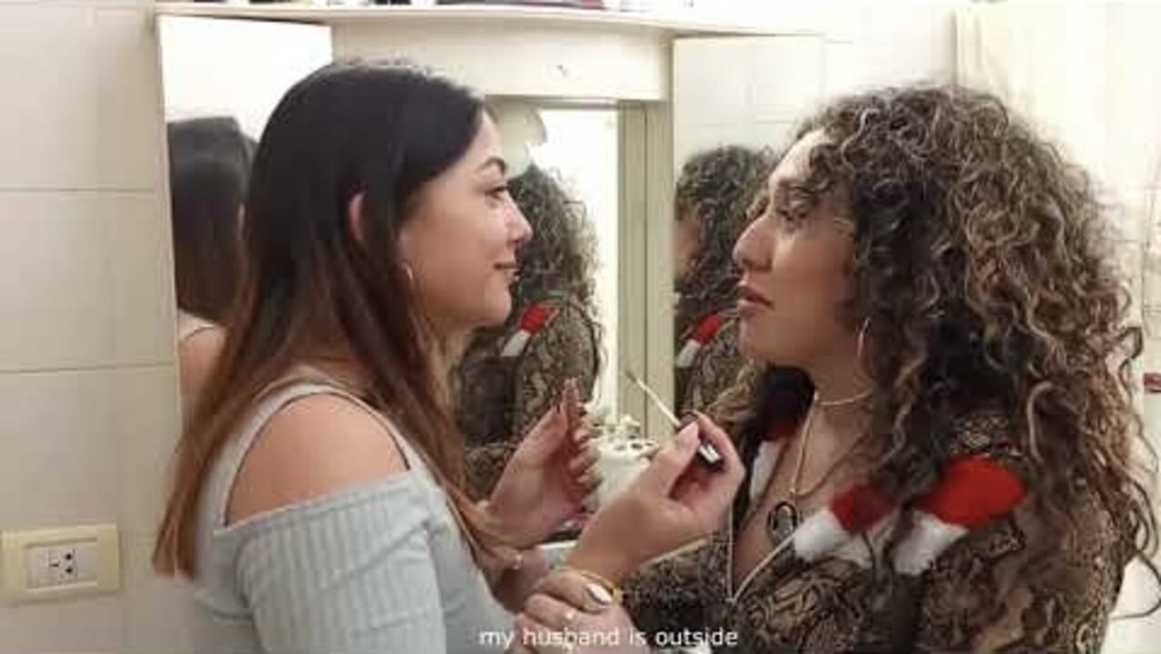 lesbian kissing mirror