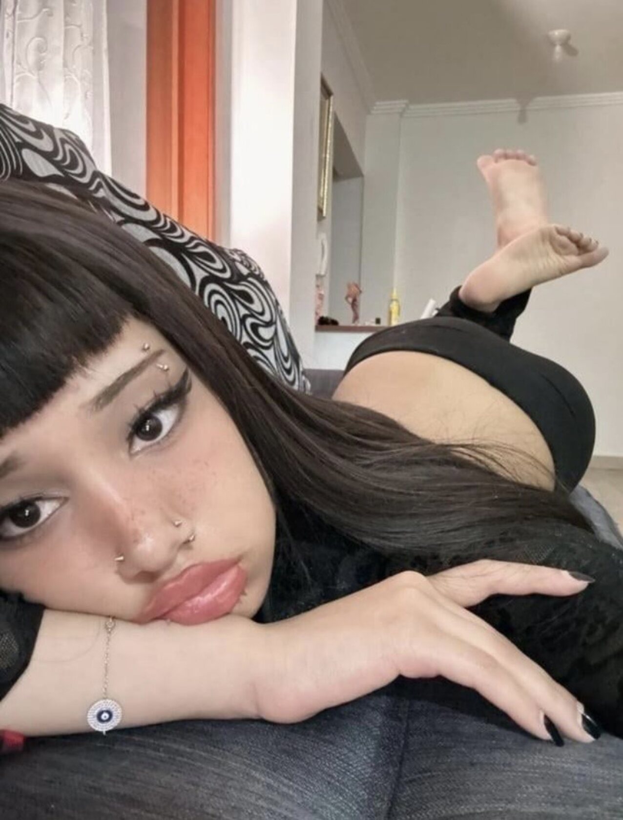 eyebrow piercing nose piercing black nails