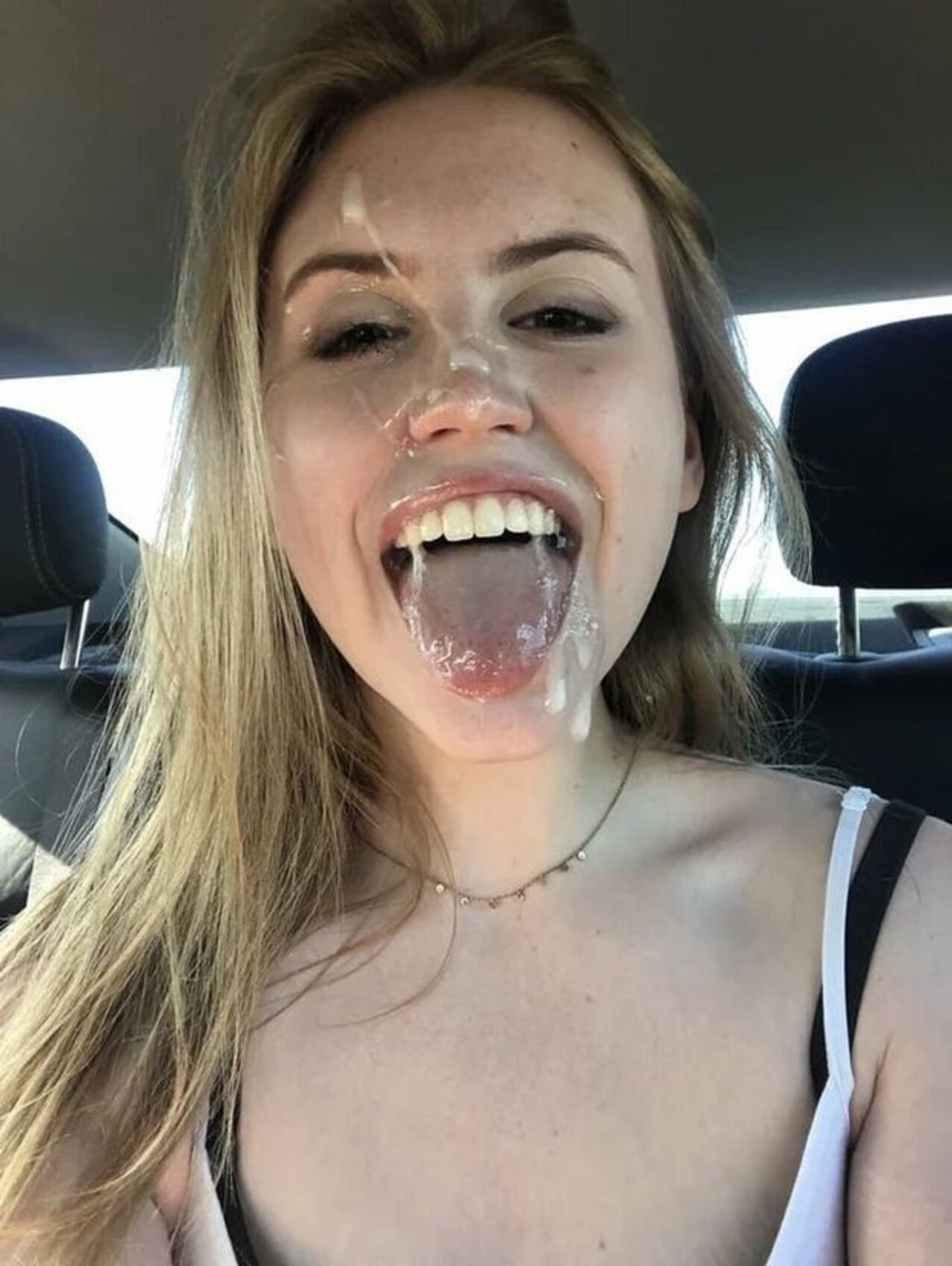 cumshot blonde cum face