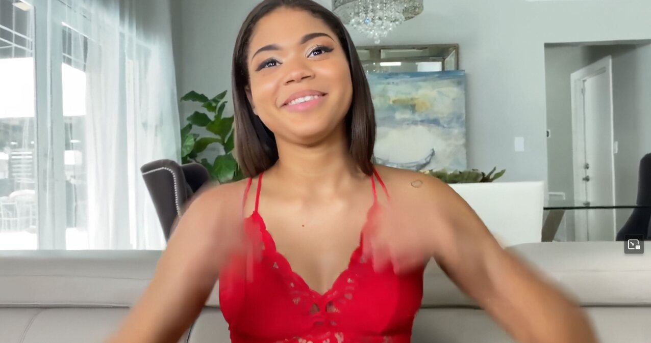 latina brunette red dress