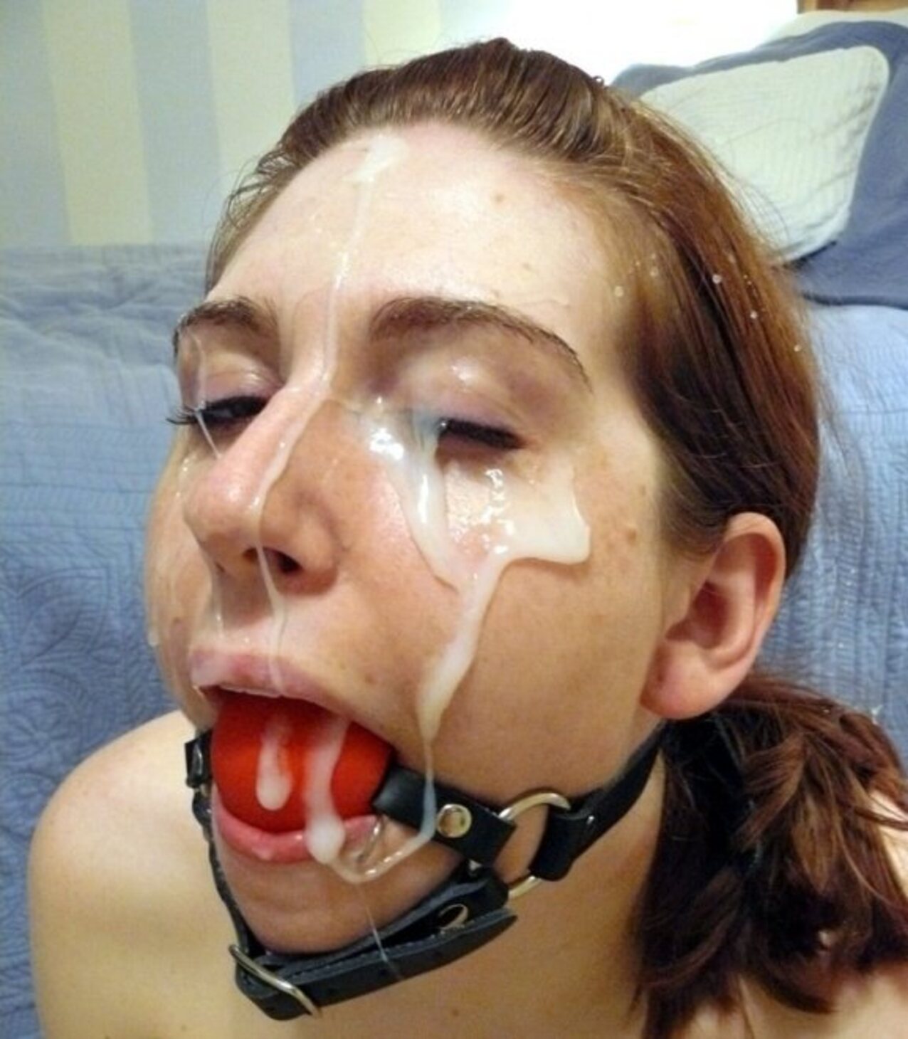 facial paintedwhite ball gag