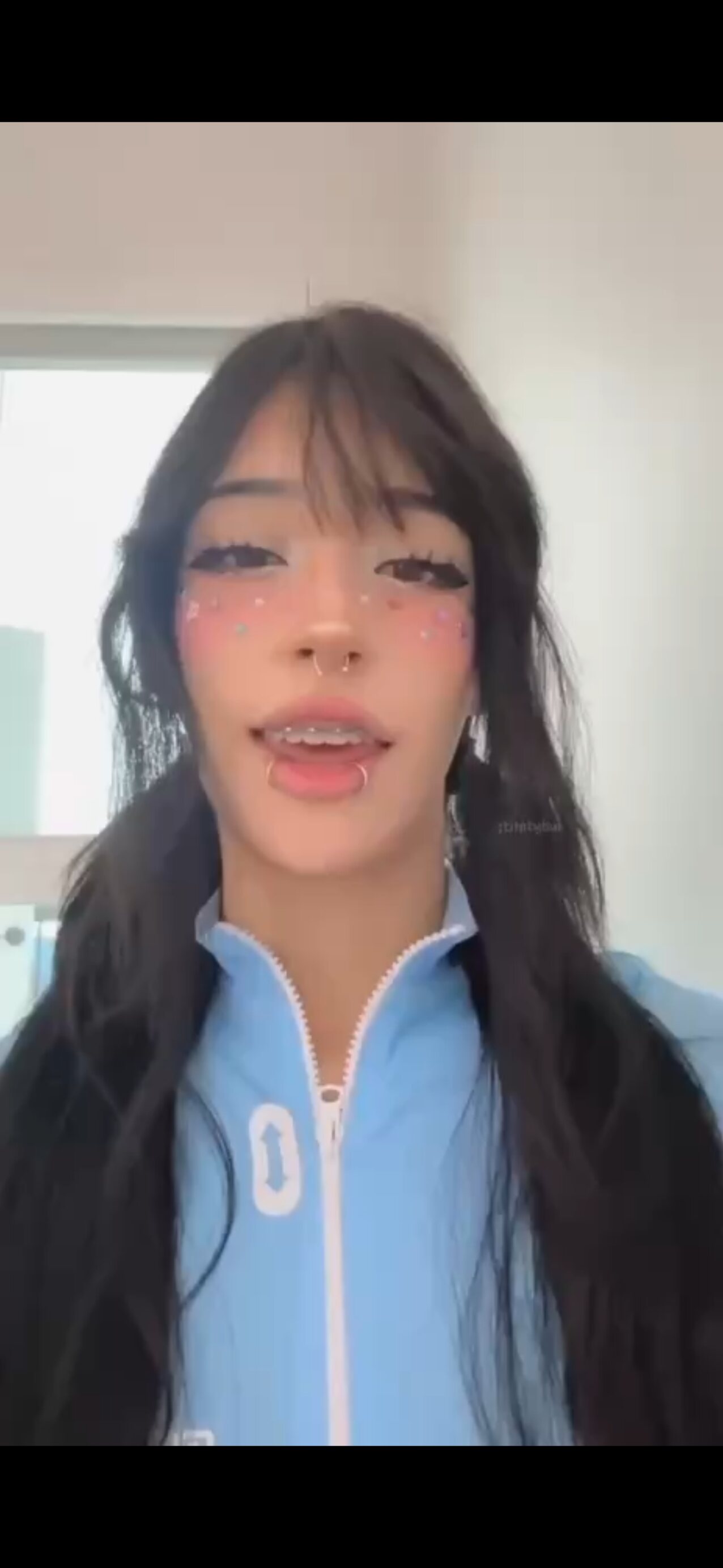 black hair ponytail piercing