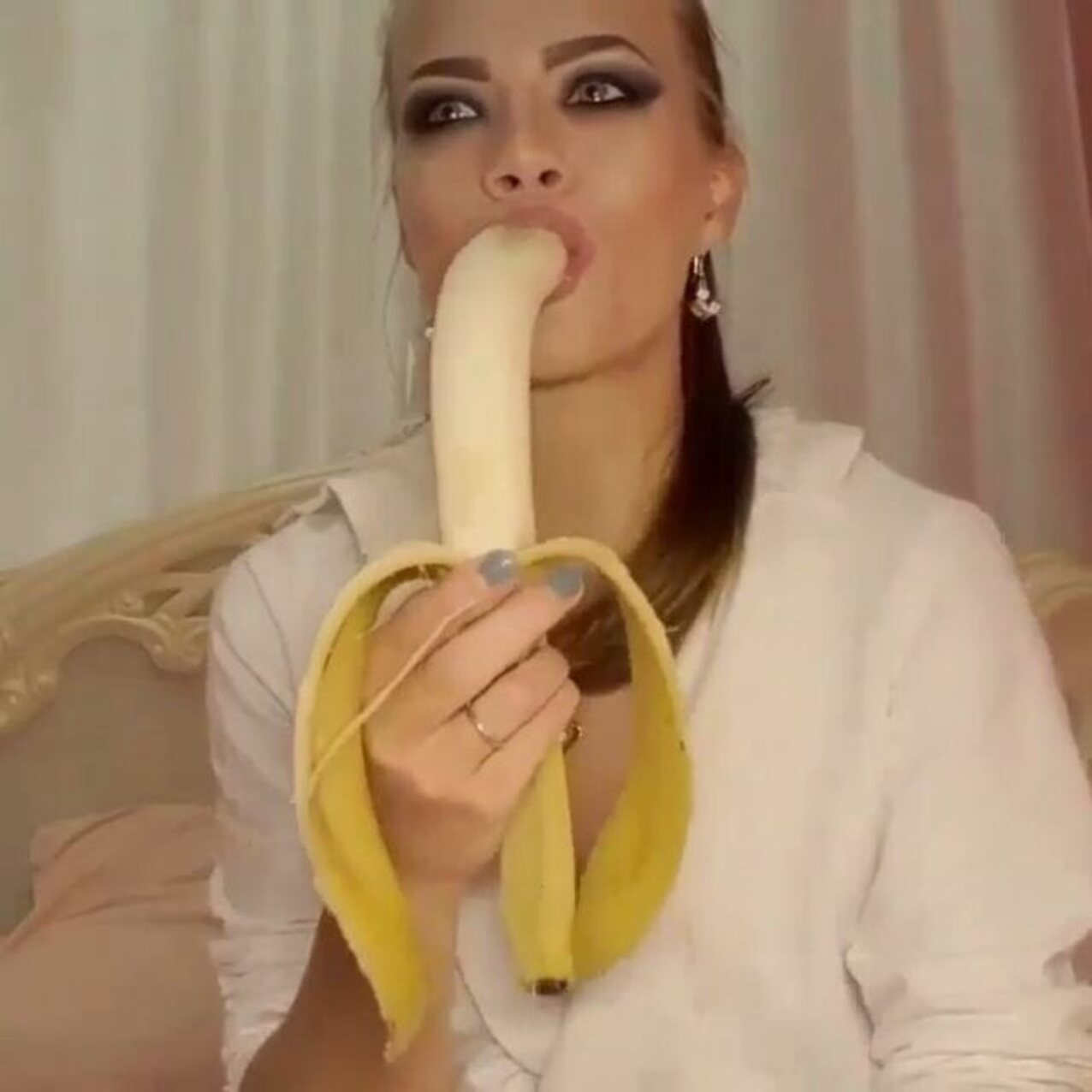 blonde banana sucking