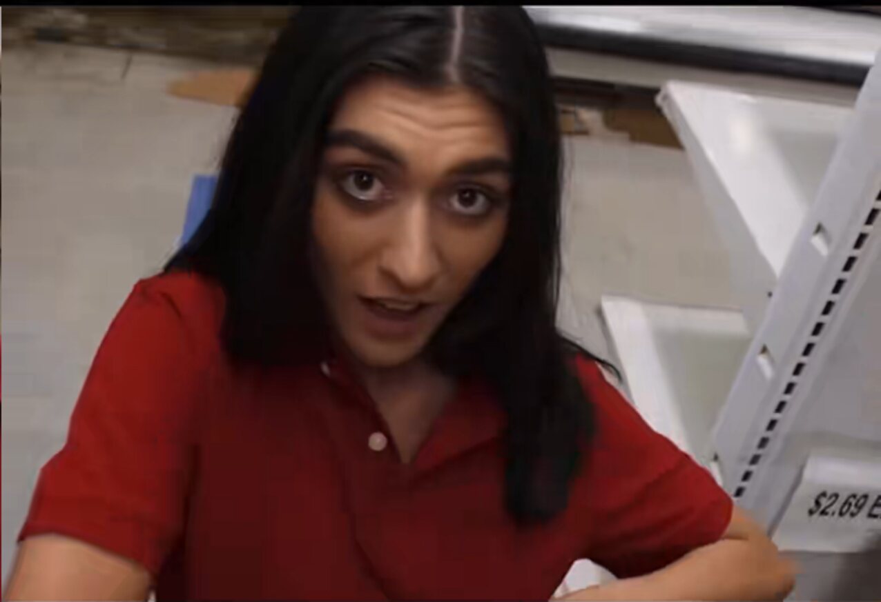 dark hair polo shirt kneeling