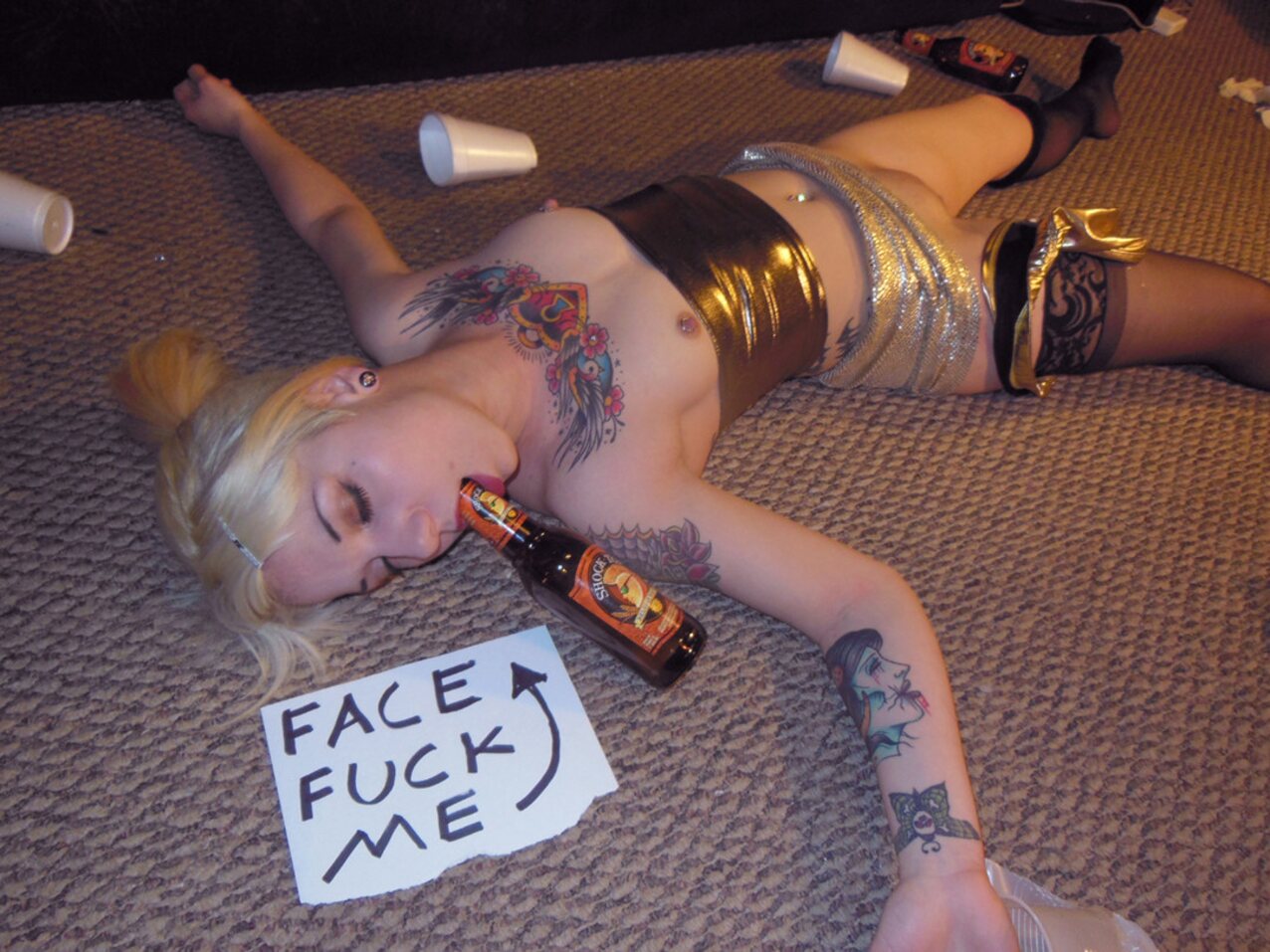 blond bottle tattoo