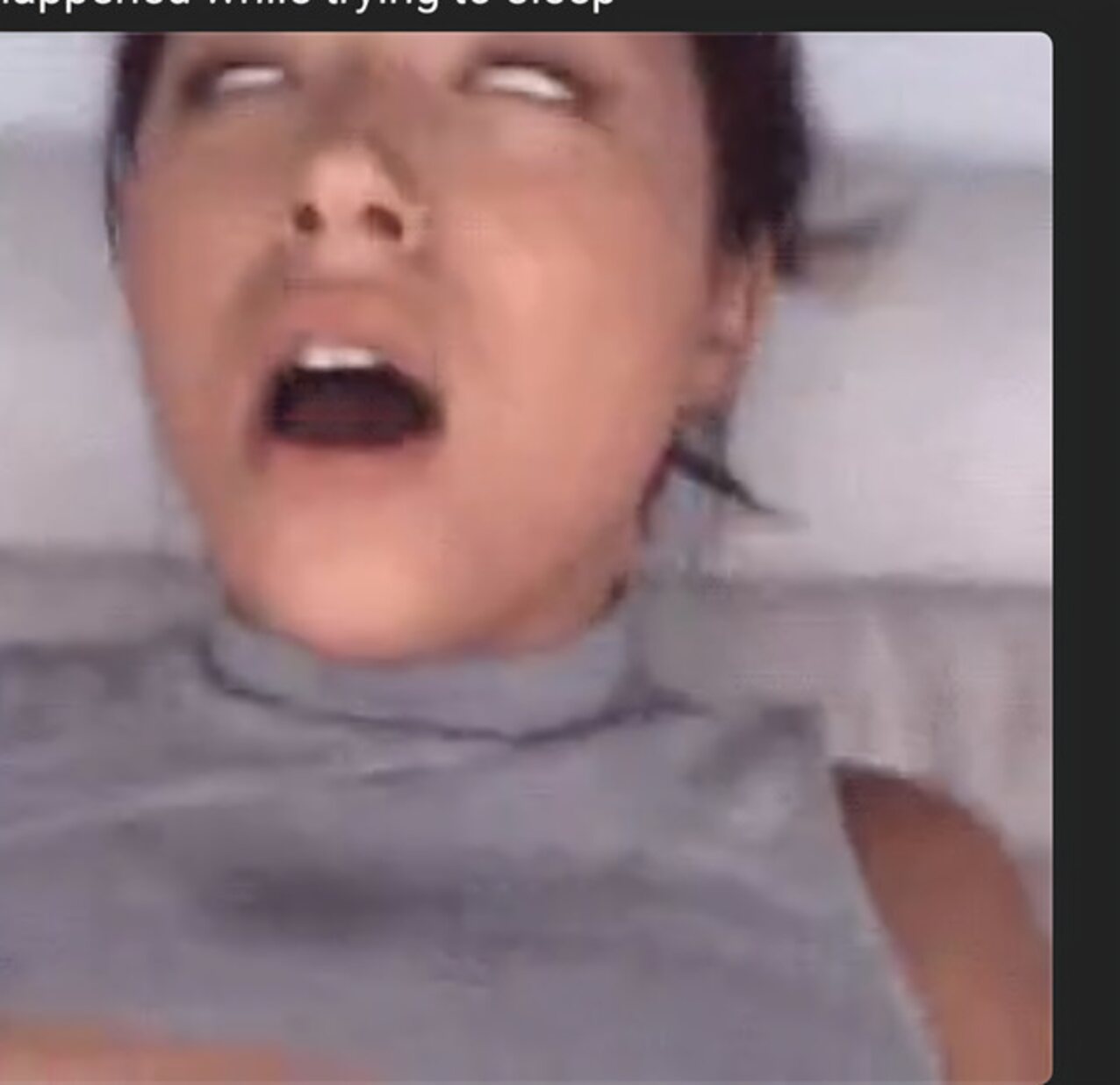 eye roll brunette grey shirt