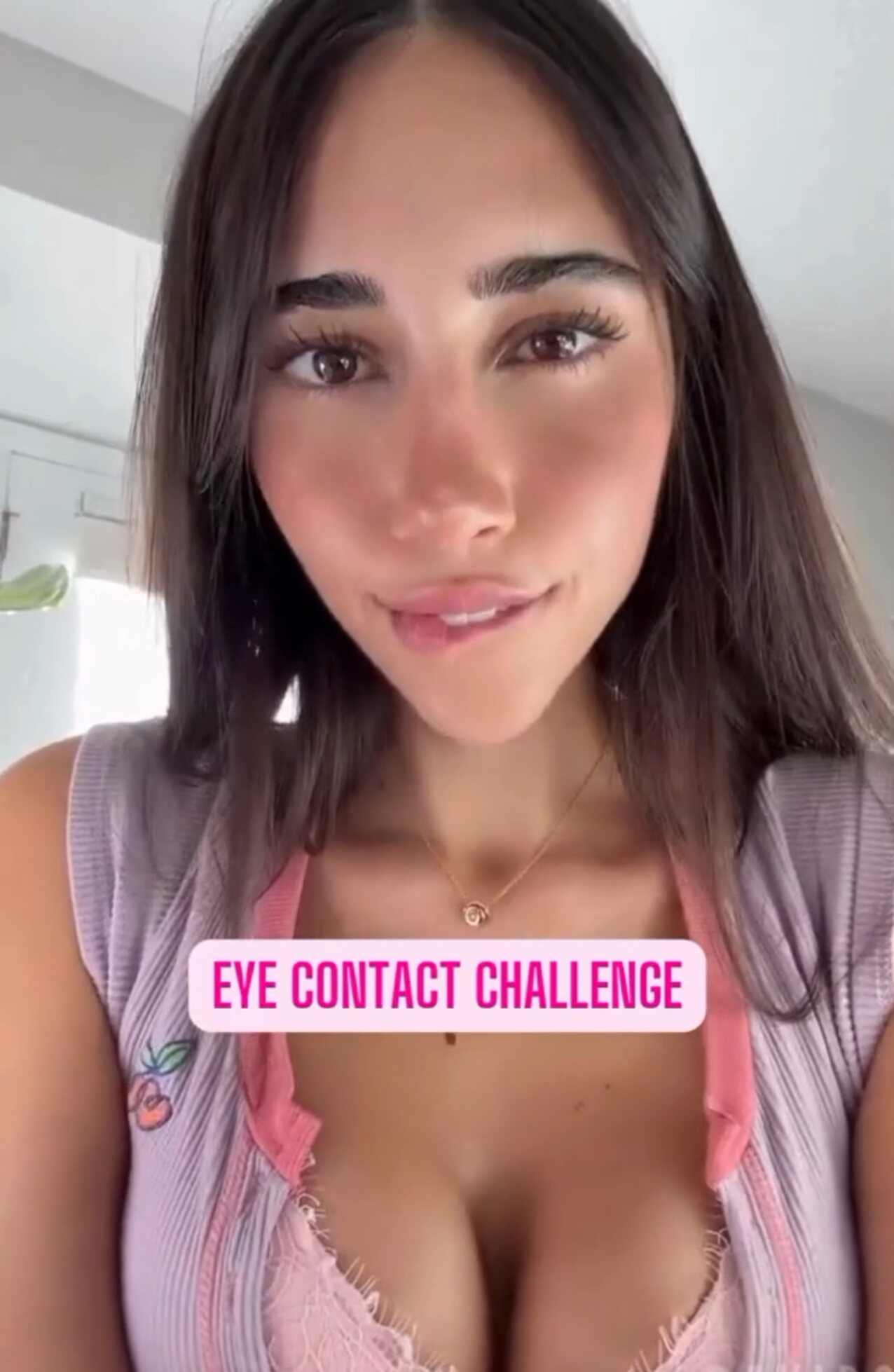 brunette eye contact tease