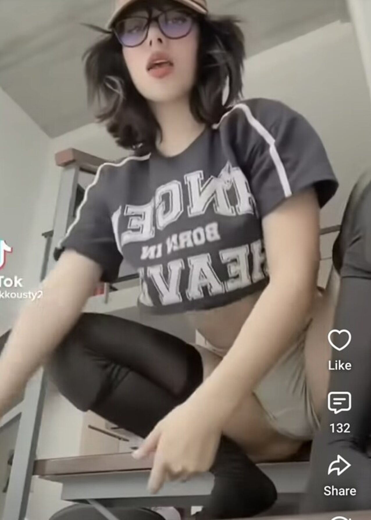 glasses squatting brunette
