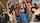 name of the blue shirt girl in the middle
