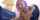 Who is this purple haired woman?