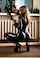 two girls in latex on a radiator