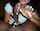 interracial brunette handjob