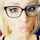 blonde glasses green eyes