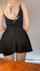 blonde black dress bend over