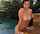 topless pool brunette