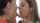lesbian kissing black hair