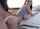 big tits outdoors againt a car